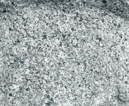 Mottled surface of granite. Stock Photos