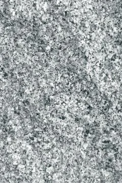 Mottled surface of granite. Stock Photos