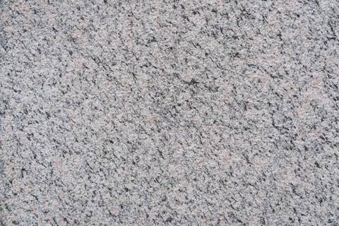 Mottled surface of granite. Stock Photos