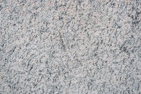 Mottled surface of granite. Stock Photos