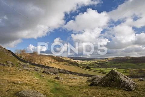 Moughton scar and wharfe dale viewed from norber erratics in yorkshire dales Stock Photos