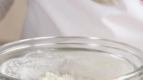 Moulding fish dumplings using two spoons Stock Footage 24665219