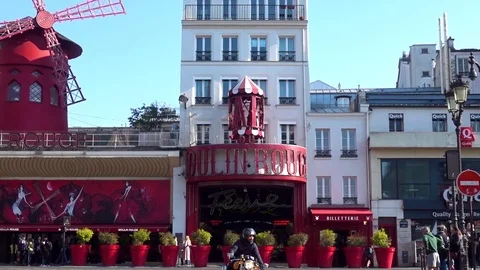Moulin Rouge (The Red Mill) Facade Paris in a beautiful Daylight Left Full Stock Footage 108219632