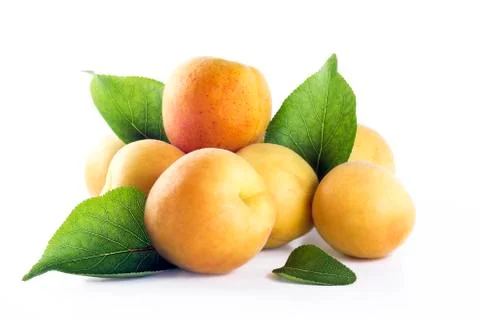 Mound of apricots with leafs Stock Photos