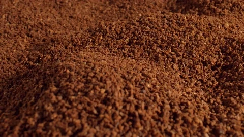 Mound of crushed coffee beans, close-up. Natural product. Recipe for making Stock Footage 165282763