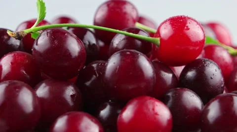 Mound of red cherries closeup rotates Stock Footage 52252644