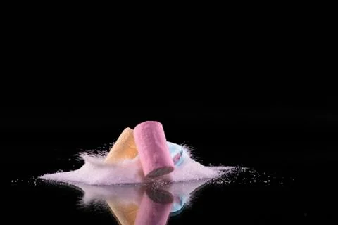 A mound of sugar with marshmallows exploding Stock Photos