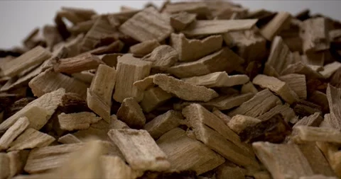 Mound of wood chips on white background. Fuel for fireplace and barbecue. Stock Footage 146797512