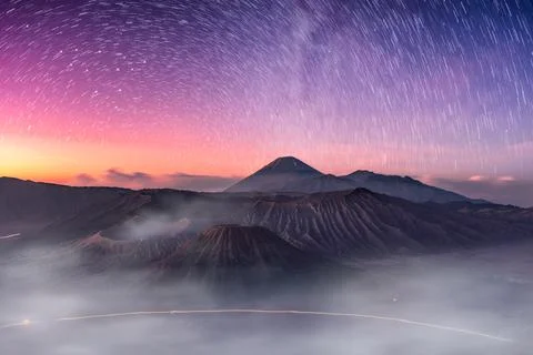 Mount active volcano, Batok, Bromo, Semeru with starry and fog at dawn Stock Photos