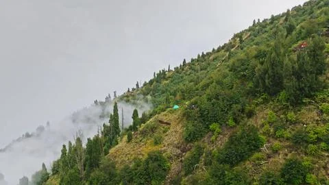 Mount Agung volcano hiking path camp and fog Stock Photos