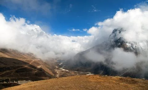 Mount Ama Dablam within clouds, way to Everest base camp Stock Photos