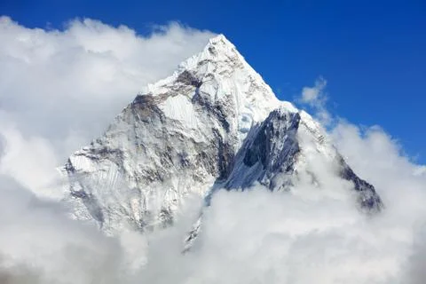 Mount Ama Dablam within clouds Stock Photos