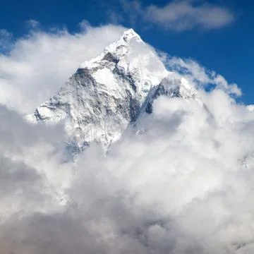 Mount Ama Dablam within clouds, way to Everest base camp Stock Photos