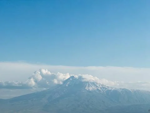 Mount Ararat with snow capped clouds Stock Photos