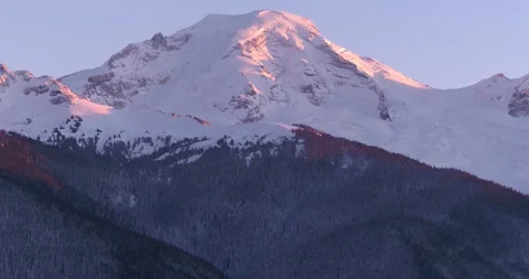 Mount Baker Alpenglow at Sunset Behind Ridge Aerial Washington Видео 332249249