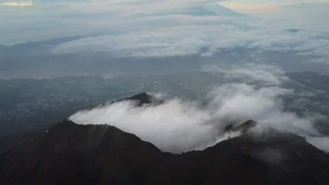 Mount Batur Crater Filled With Moving Clouds at Sunrise, Gunung Batur Bali Stock Footage 345217049