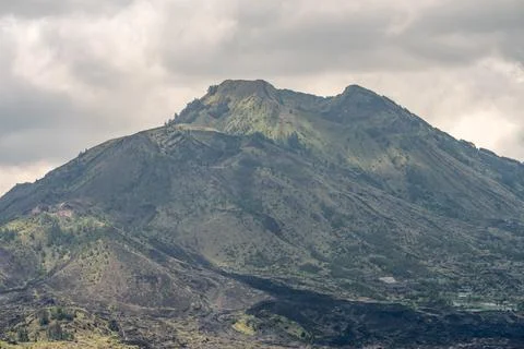 Mount Batur Summit Under Dramatic Clouds in Bali Stock-Fotos