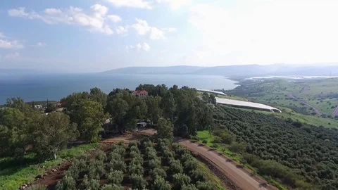 Mount of Beatitudes - church reveal - Sea of Galilee - Beautiful day Stock Footage