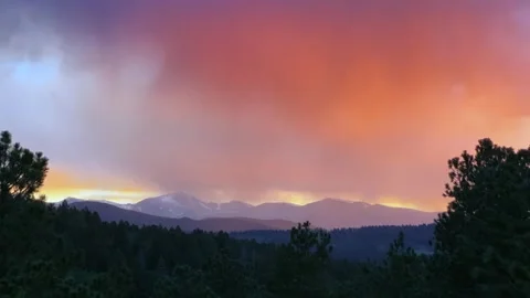 Mount Blue Sky rain sunset golden hour vibrant orange dark clouds vibrant Stock Footage 346327663
