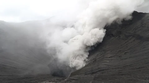 Mount Bromo is an active volcano and part of the Tengger massif, in East Java Stock Footage 65262378