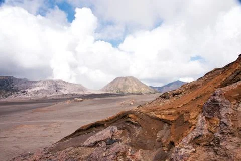 Mount Bromo, an active volcano with sky of clouds  in East Java, Indonesia. Stock Photos