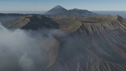Mount Bromo and Mount Batok Emerging Above the Clouds Stock-Footage 341998317