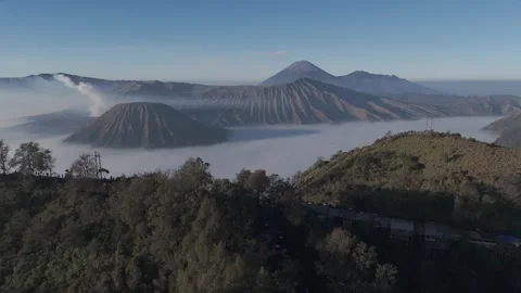 Mount Bromo Crater Surrounded by Clouds at Sunrise Stock-Footage 341998003