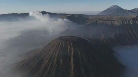 Mount Bromo Crater Surrounded by Clouds at Epic Sunrise Stock-Footage 341998141