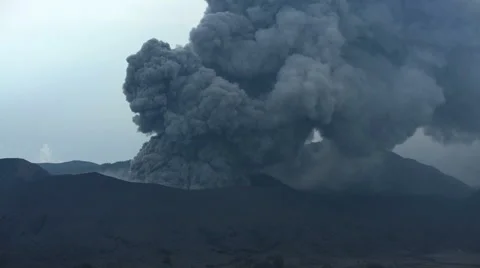 Mount Bromo a remote erupting active volcanic mountain volcano Java Indonesia Stock Footage 67395304