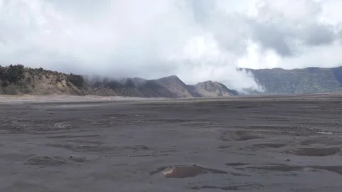 Mount Bromo Volcanic Steam Cloud Over Sand Plain East Java Video stock 344892751