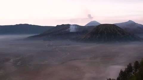 Mount Bromo volcano in the clouds at dawn in East Java Indonesia 動画素材 259853659