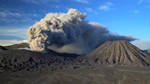 Mount Bromo volcano eruption a mud river delta Java Indonesia Stock Footage 67390959