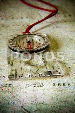 Mount despair with compass Stock Photos