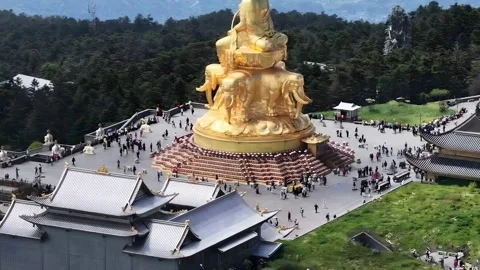 Mount Emei Golden Summit: Samantabhadra Bodhisattva Statue with Tourists Stock Footage 336294466