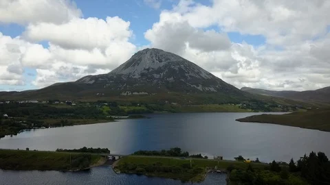 Mount Errigal orbit with lake Stock Footage 129739462