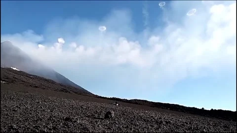 Mount Etna Blows Vortex Rings Into Sky in Italy 2 Stock Footage 276731087