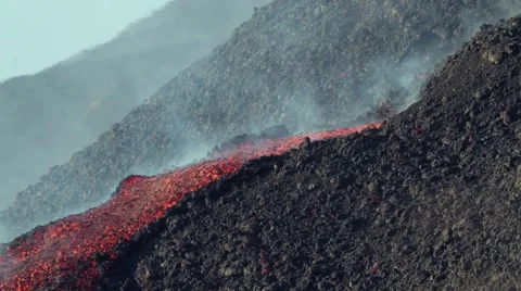 Mount Etna with small lava flow from vent Stock Footage 53847391