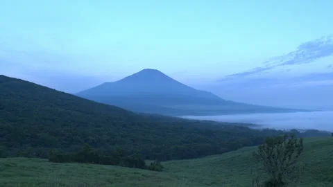Mount Fuji and Sea of Clouds Engulfing Lake (Vertical/Time Lapse/ZOOM IN) Stock Footage 339292821