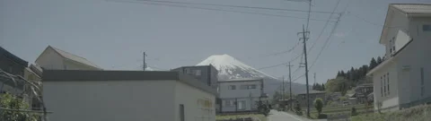 MOUNT FUJI APPROACH FROM STREETS. Anamorphic 4k LOG Stock Footage 247076299