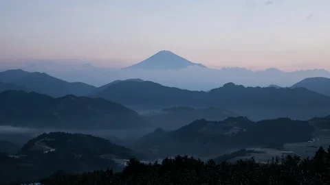 Mount Fuji over Mountains and a  Sea of Clouds in the Morning Stock Footage 86409337