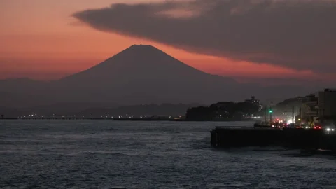 Mount Fuji Silhouette Sunset View from Kamakura Coast with Ocean Waves Japan Stock Footage 337694871