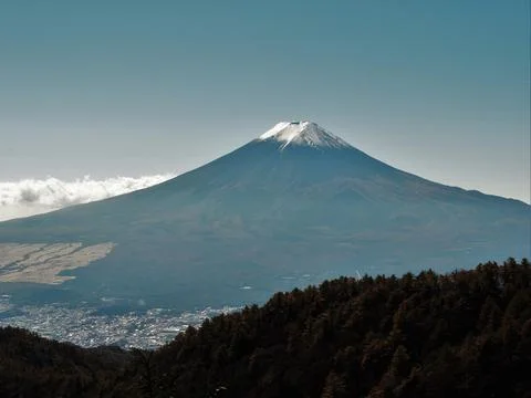 Mount fuji volcano peak overlooking japanese landscape Stock Photos