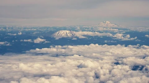 Mount Hood Mount Rainer Mount Adams Mount St Helens from Airplane Window Aerial Video stock 280702722