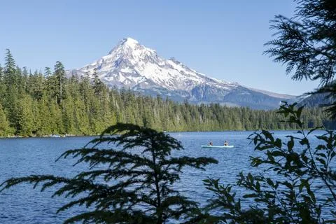 Mount Hood Reflected Above Lost Lake with Canoe on Water Stock Photos