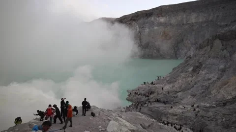 Mount Kawah Ijen active volcano in East Java, Indonesia turquoise acidic crater Stock-Footage 336556224