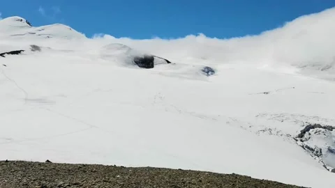 Mount Kazbek is covered with clouds Stock Footage 175938323
