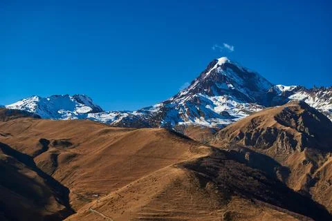 Mount Kazbek, the third highest peak in Georgia. Greater Caucasus. Stock Photos