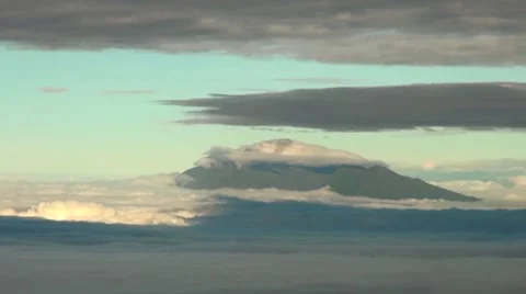 Mount Kilimanjaro is covered by clouds (time lapse). Tanzania Stock Footage 56342932
