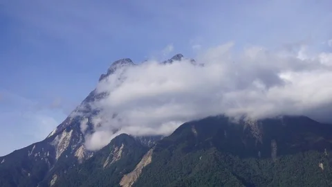 Mount Kinabalu with clouds Stock Footage 70731108
