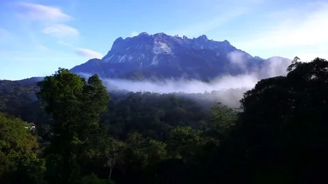 Mount Kinabalu with fast moving fogs Stock Footage 73604013